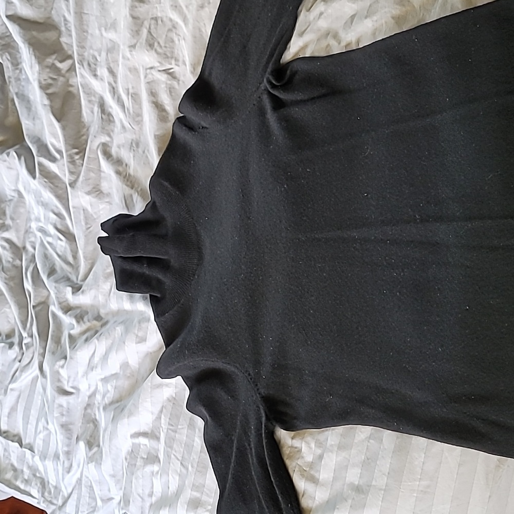 Cashmere turtleneck.